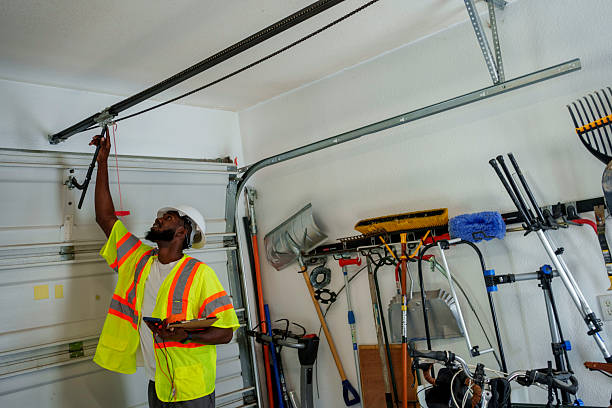 Professional Garage Door Installation technician working in Santa Claus, IN